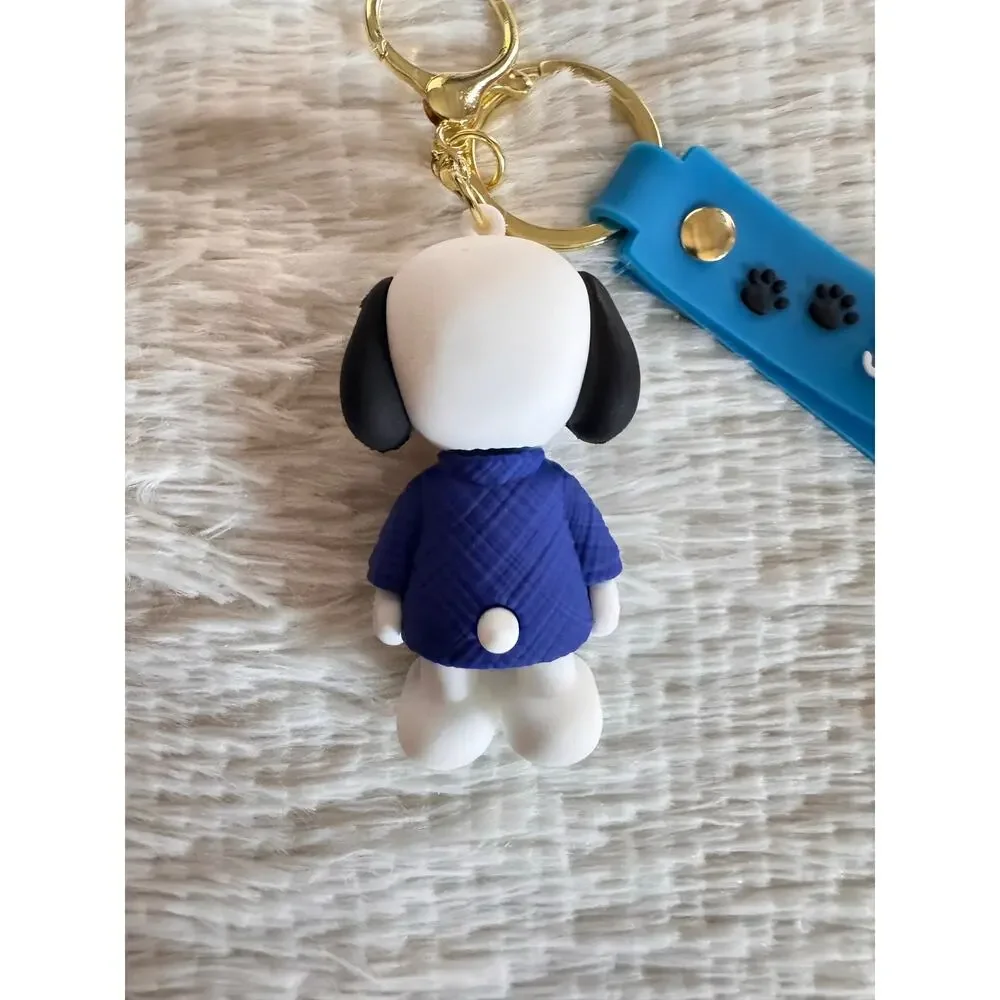 Snoopy suit and red bow tie keychain blue strap and white Snoopy face graphic